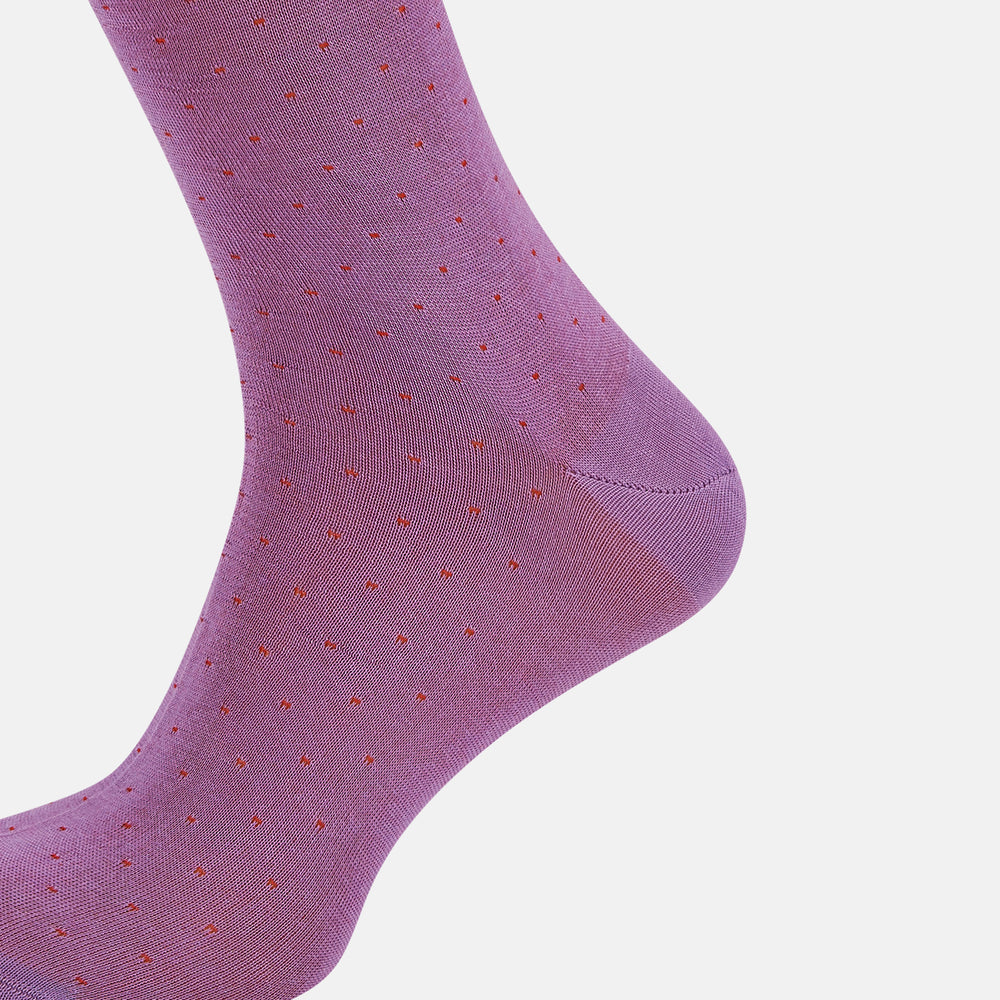 A single Pink/Red Polka Dot Long Sock by Turnbull & Asser, featuring a ribbed cuff and subtle red polka dots, is displayed against a plain white background.
