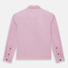 View 3 of product The Pink Hyde Overshirt by Turnbull & Asser is a long-sleeved, light pink sanforised cotton shirt with a left chest pocket and dark buttons—an elegant, laid-back alternative to a blazer.