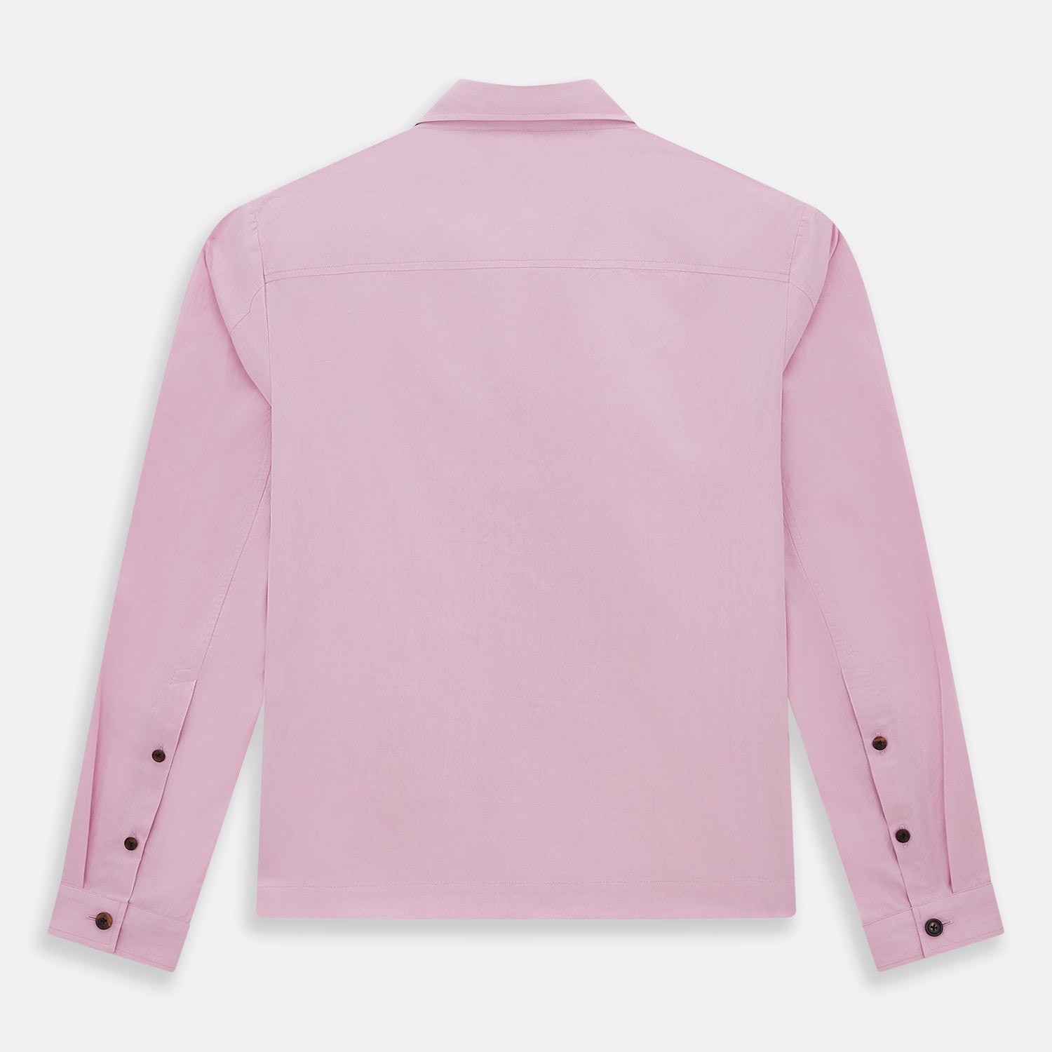 View 3 of product The Pink Hyde Overshirt by Turnbull & Asser is a long-sleeved, light pink sanforised cotton shirt with a left chest pocket and dark buttons—an elegant, laid-back alternative to a blazer.