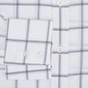 View 4 of product The Turnbull & Asser Grey Grid Check Mayfair Shirt features a classic collar and buttoned cuffs, crafted from fine Italian cotton with a grey grid check on white, and is shown against a plain white background.