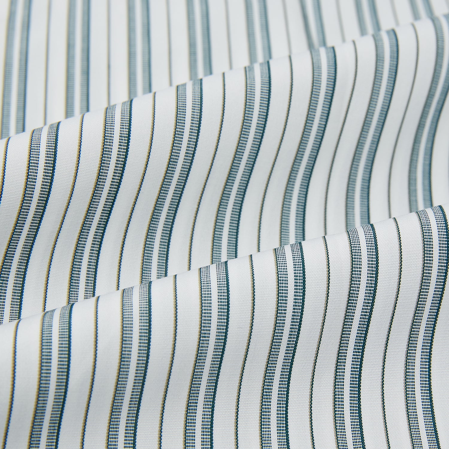 View 5 of product The Green Double Stripe Quarzo Nightshirt by Turnbull & Asser is a relaxed-fit, long-sleeve, knee-length Italian cotton shirt dress with a collar, partial button-down front, chest pocket, and buttoned cuffs in green and white stripes.