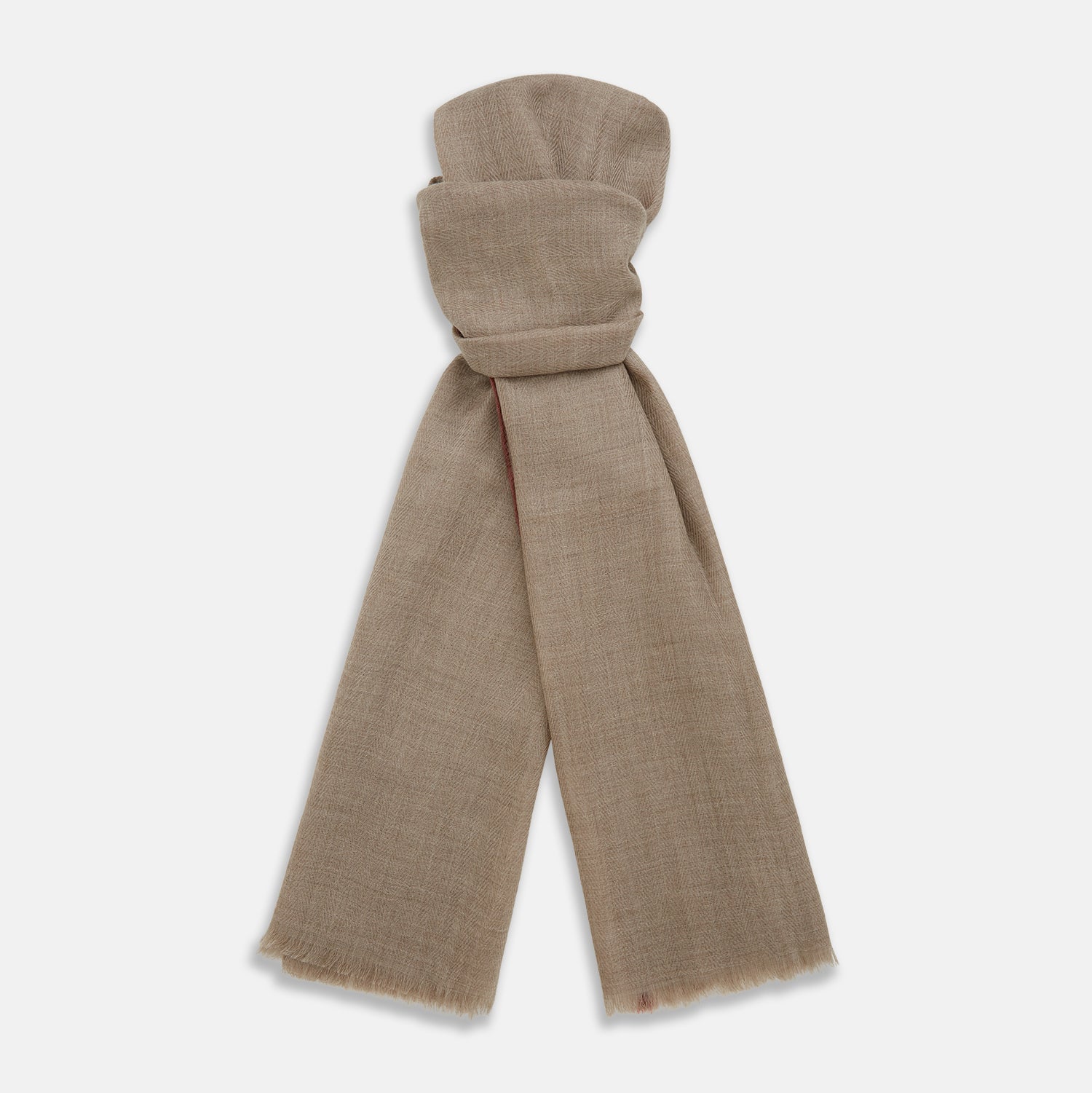 View 1 of product The Turnbull & Asser Camel and Cognac Cashmere Scarf features a subtle texture and softly frayed edges, elegantly knotted at the center—an ideal formal accessory. Displayed against a white background.