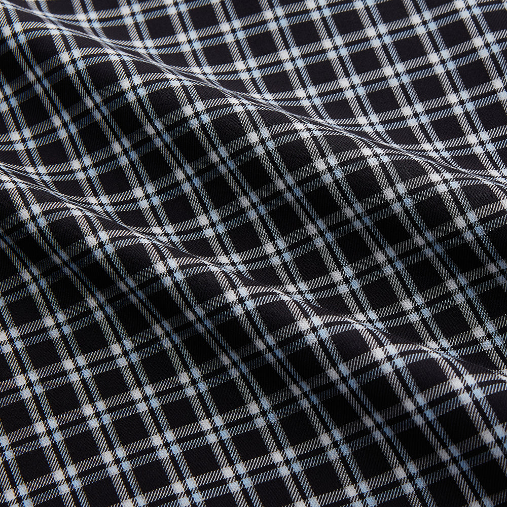 The Turnbull & Asser Black Multi Check Cotton Blend Weekend Fit Hayne Shirt features a Dorset button-down collar and white buttons, with a black and white plaid pattern, shown laid flat on a white background.
