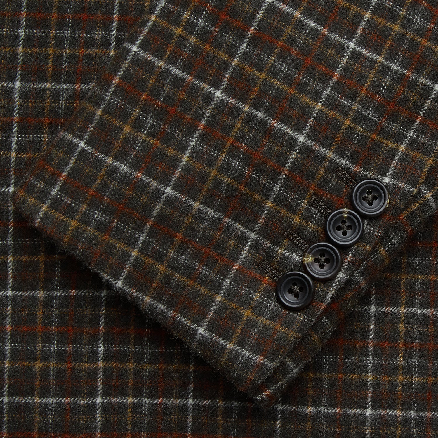 View 3 of product The Green Multi Check Cashmere Barrington Blazer by Turnbull & Asser, featuring a single-breasted design, notched lapel, and two front flap pockets, is shown laid flat on a white background.