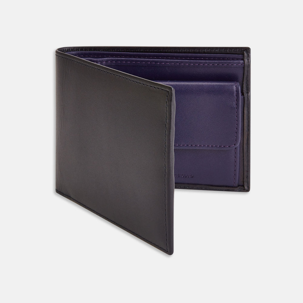 The Turnbull & Asser Bill Coin Wallet is a black leather bifold with a visible purple interior, card slots, and a coin pocket.