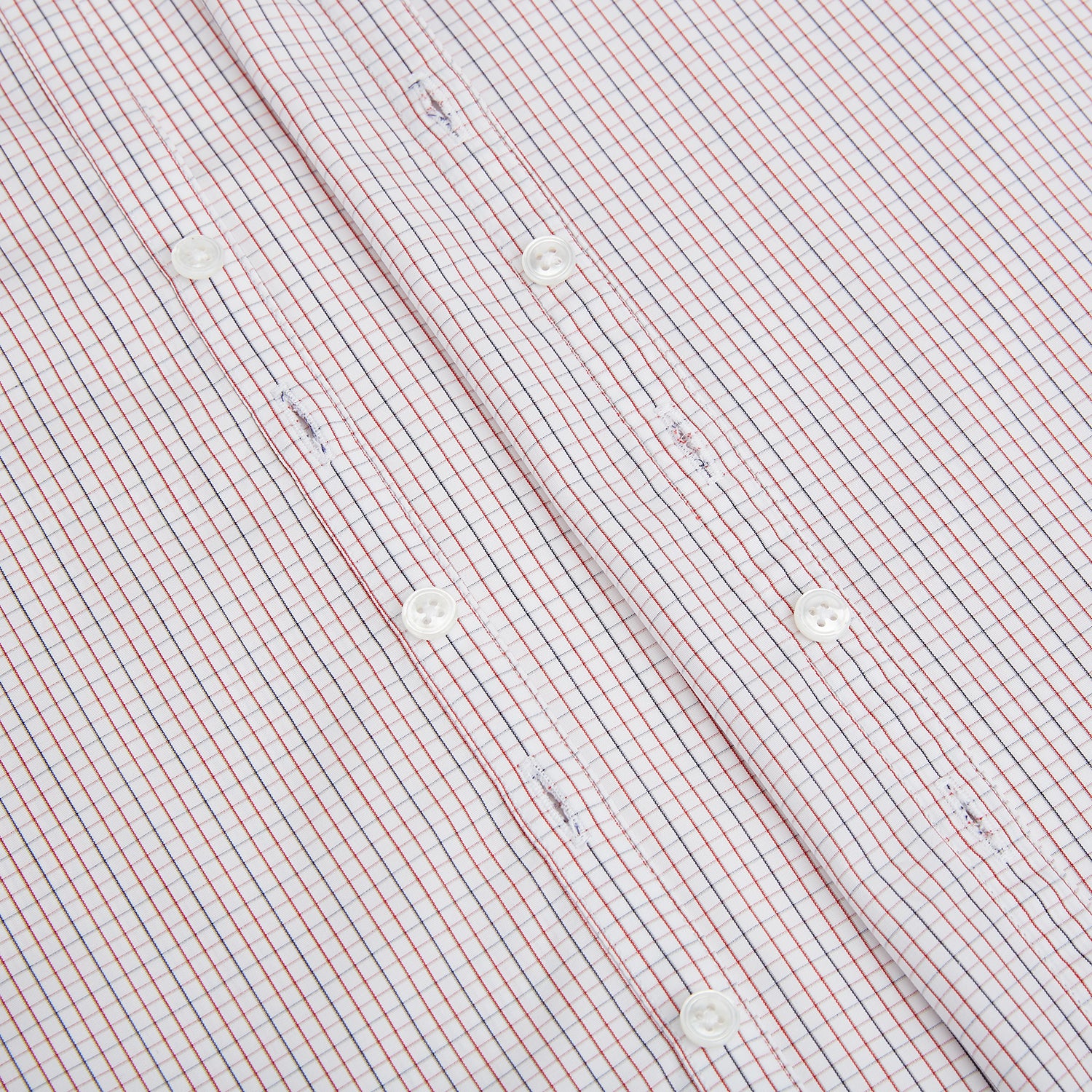 View 7 of product The Turnbull & Asser Red and Navy Check Windsor Shirt features a pointed collar and cuffed long sleeves, highlighting British craftsmanship. Displayed flat on a white background.