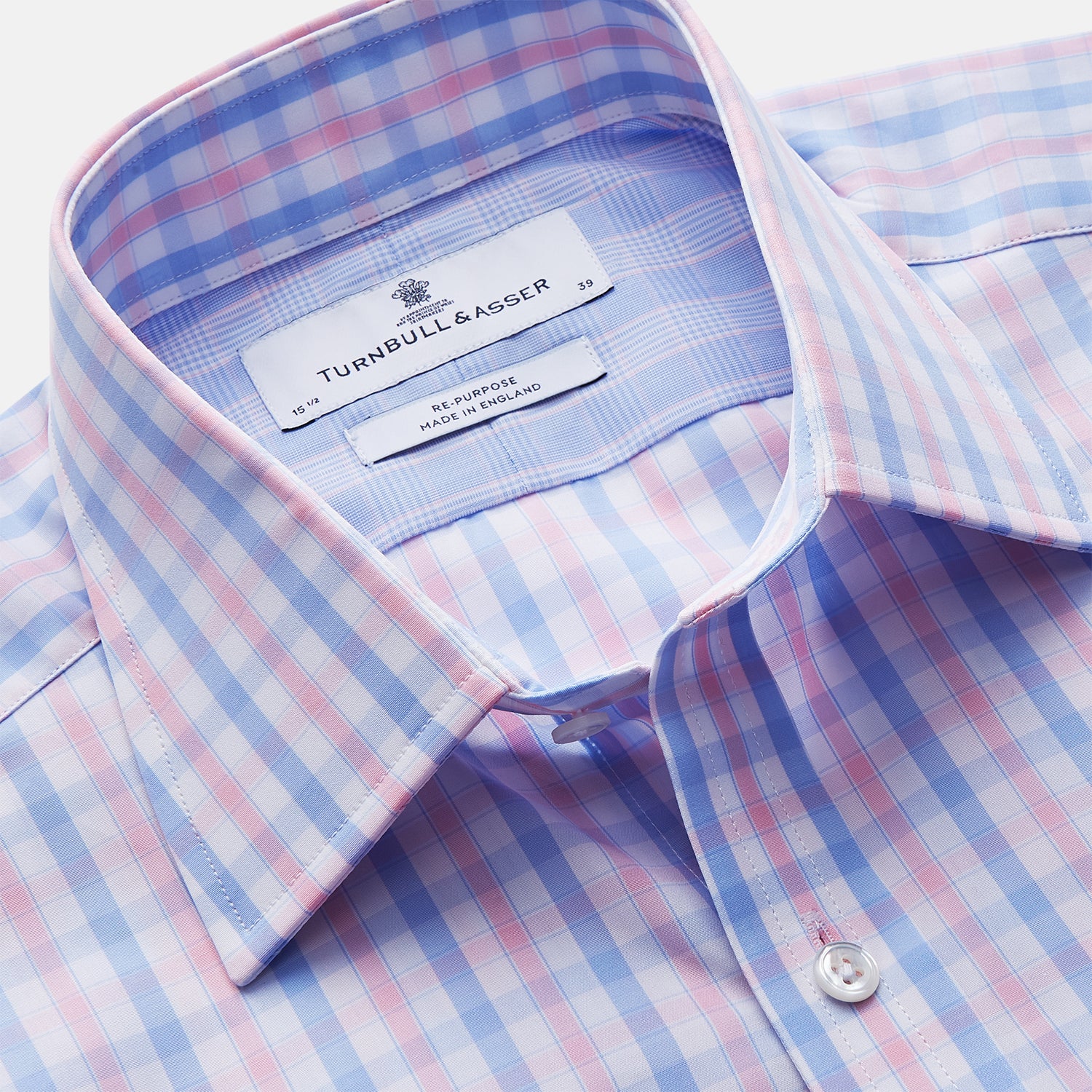 View 2 of product The Turnbull & Asser Red and Blue Multi Check Cotton RE-PURPOSE Mayfair shirt is a sustainable, long-sleeve button-up with a collar and cuffed sleeves, crafted from recycled fabrics and shown laid flat on a white background.