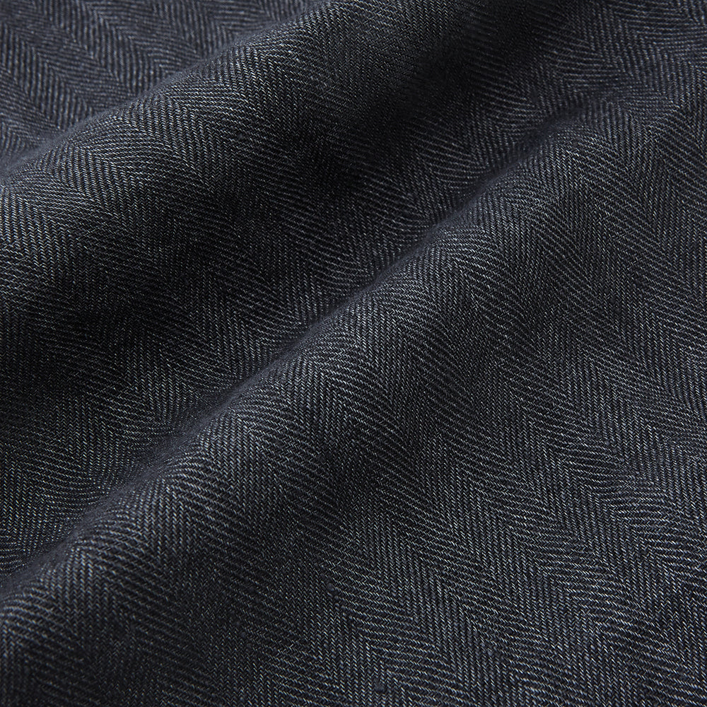 The Ash Linen Herringbone Edmund Trousers by Turnbull & Asser feature a straight-leg fit, button closure, belt loops, and side pockets in summer-ready fabric—ideal for utility dressing—shown against a plain white background.