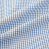 View 6 of product The Turnbull & Asser Blue Micro Shadow Check Mayfair Shirt features a long-sleeve, button-up design with a small blue and white check pattern, pointed T&A collar, and classic cuffs.