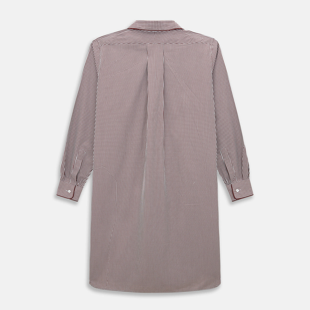 The Turnbull & Asser Burgundy Micro Check Winston Long Nightshirt is knee-length with long sleeves, brown and white micro checks, a collar, chest pocket with piping, and a front button placket.