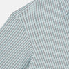 View 6 of product The Turnbull & Asser Forest Melange and Red Overlay Grid Check Westminster Shirt features long sleeves, a pointed collar, and buttoned cuffs, highlighting British craftsmanship. It's shown laid flat against a white background.