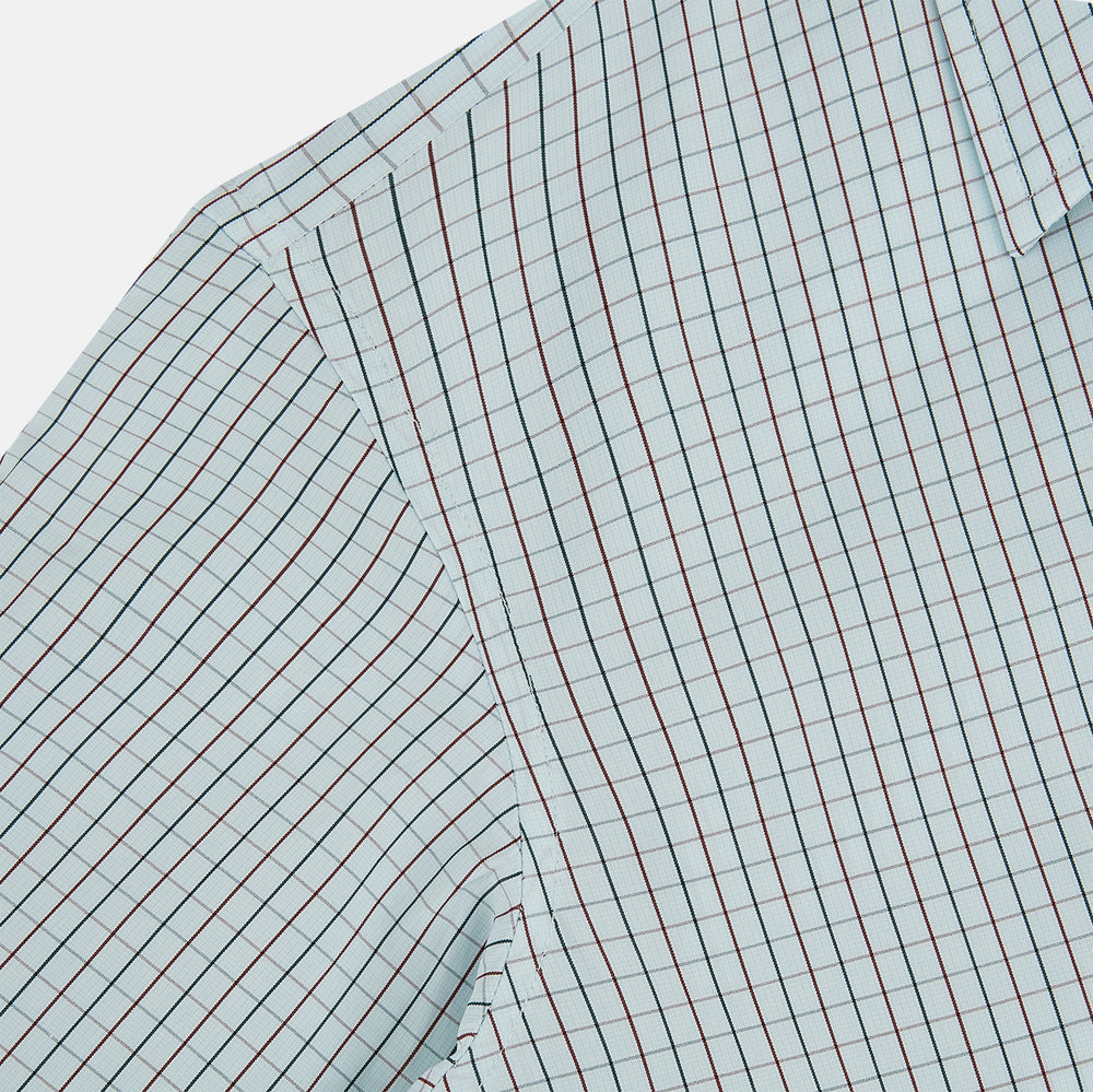 The Turnbull & Asser Forest Melange and Red Overlay Grid Check Westminster Shirt features long sleeves, a pointed collar, and buttoned cuffs, highlighting British craftsmanship. It's shown laid flat against a white background.