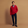 View 2 of product The Turnbull & Asser Raspberry Red Cashmere Edwards V-Neck Sweater features long sleeves, ribbed cuffs and hem, and is shown laid flat on a white background.