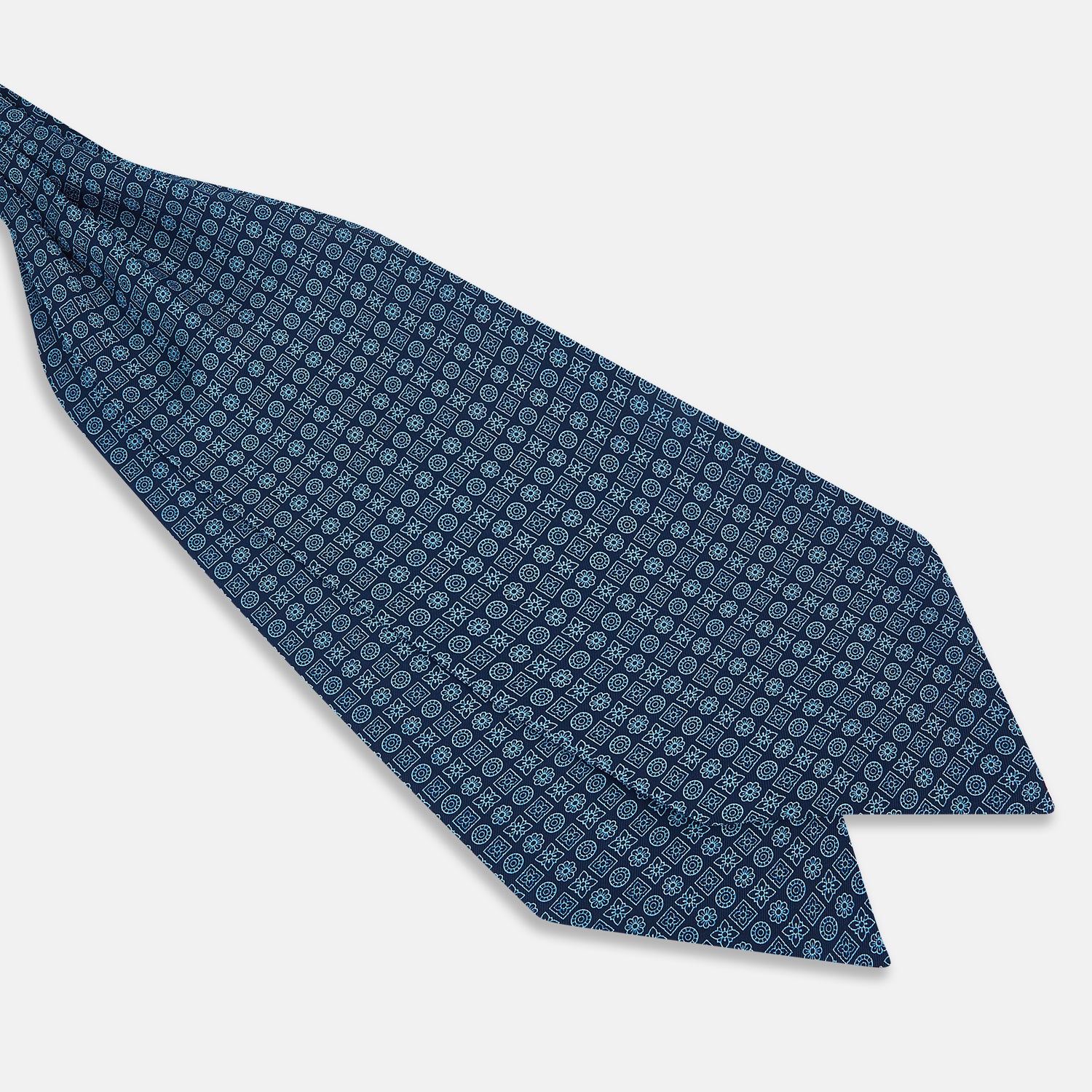 View 3 of product The Turnbull & Asser Dark Navy Floral Tile Pattern Printed Silk Cravat features a British-inspired light blue floral tile design, elegantly displayed on a white background.