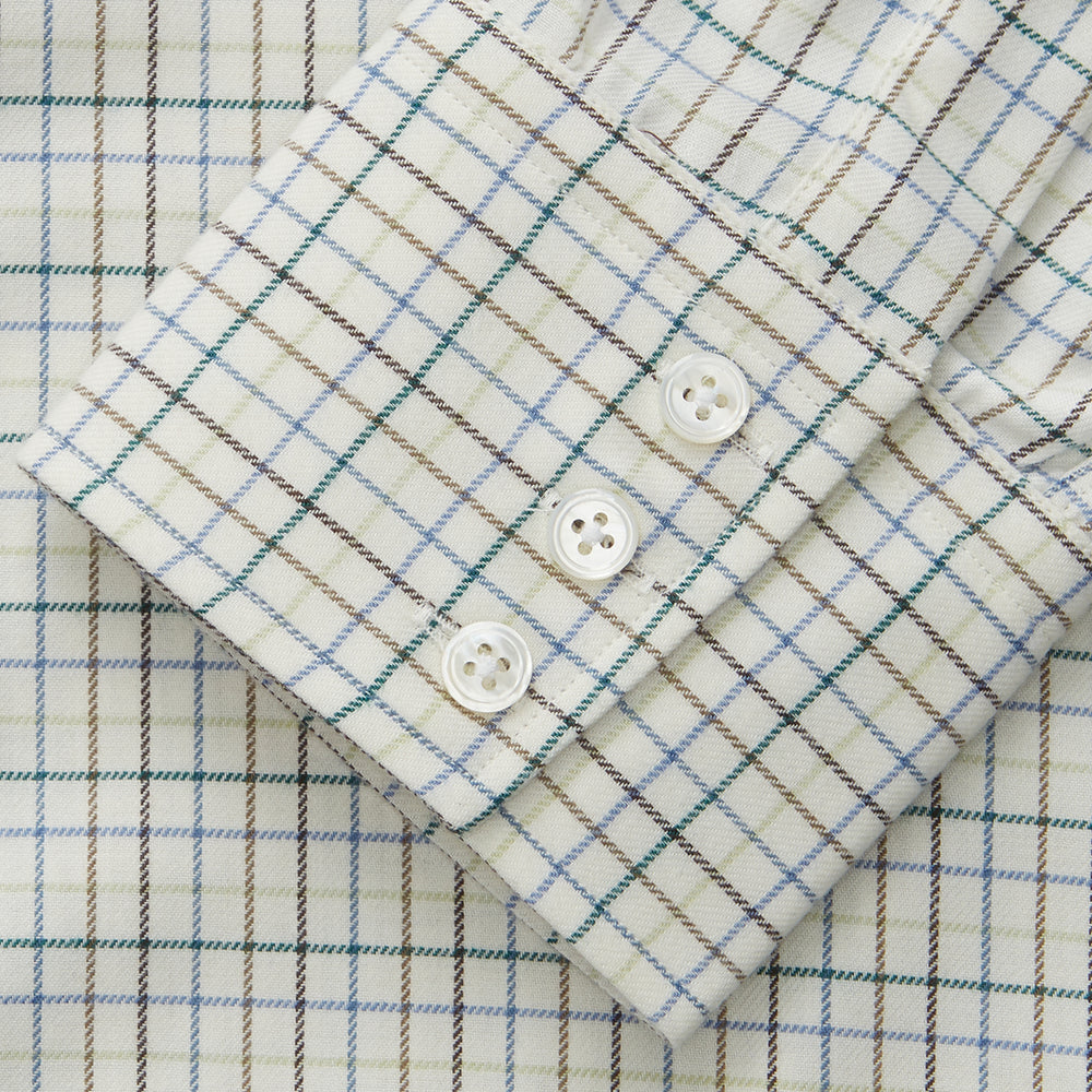 A Turnbull & Asser Green Tattersall Check Cashmerello Regular Fit Mayfair Shirt, featuring a long-sleeve button-up style with a green checkered pattern, is displayed on a plain white surface.