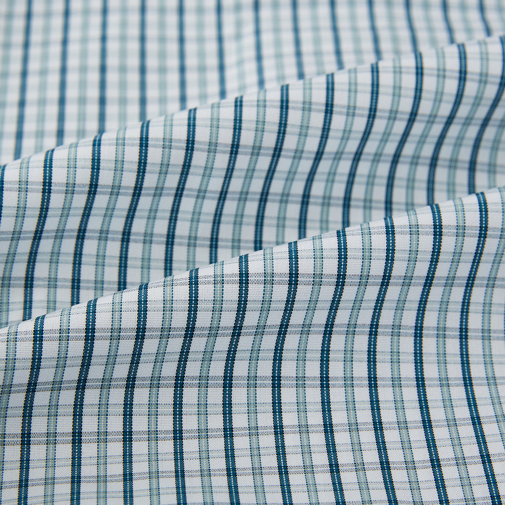 The Turnbull & Asser Light Petrol Micro Tattersall Check Mayfair Shirt features long sleeves, a classic collar, buttoned cuffs, and is crafted from Italian cotton in a refined blue and white check pattern.
