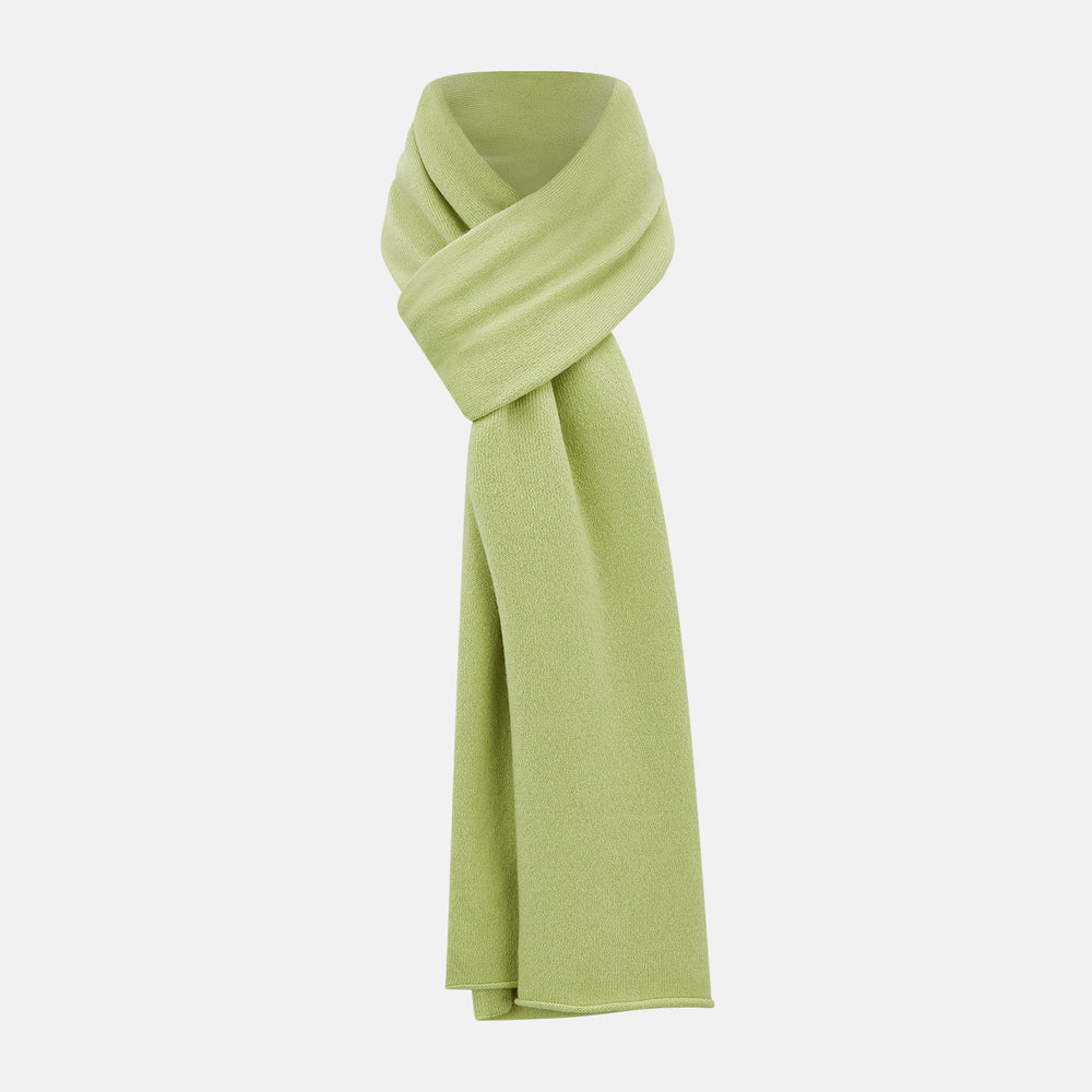The Plain Canary Yellow Cashmere Knitted Scarf from Turnbull & Asser is a soft, premium accessory, elegantly draped against a white background—an essential addition to any wardrobe.