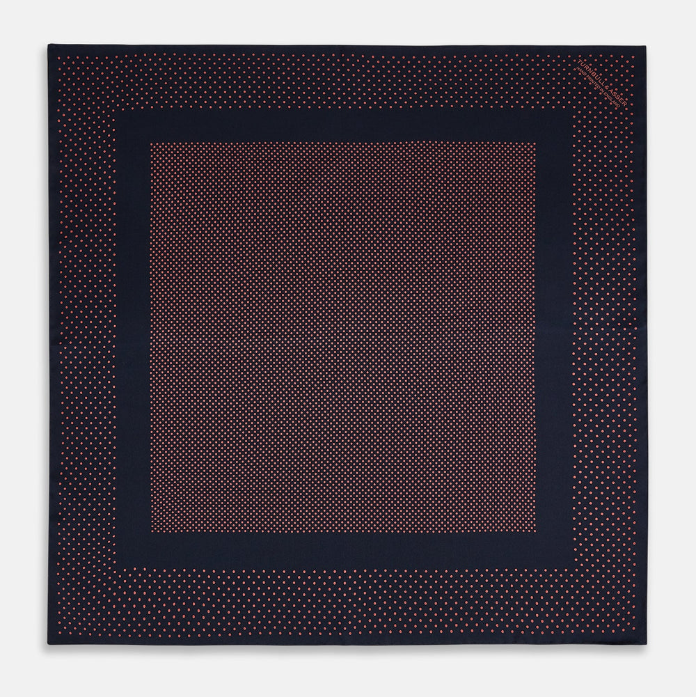The Turnbull & Asser Navy and Orange Dot Silk Pocket Square features exquisite handmade craftsmanship.
