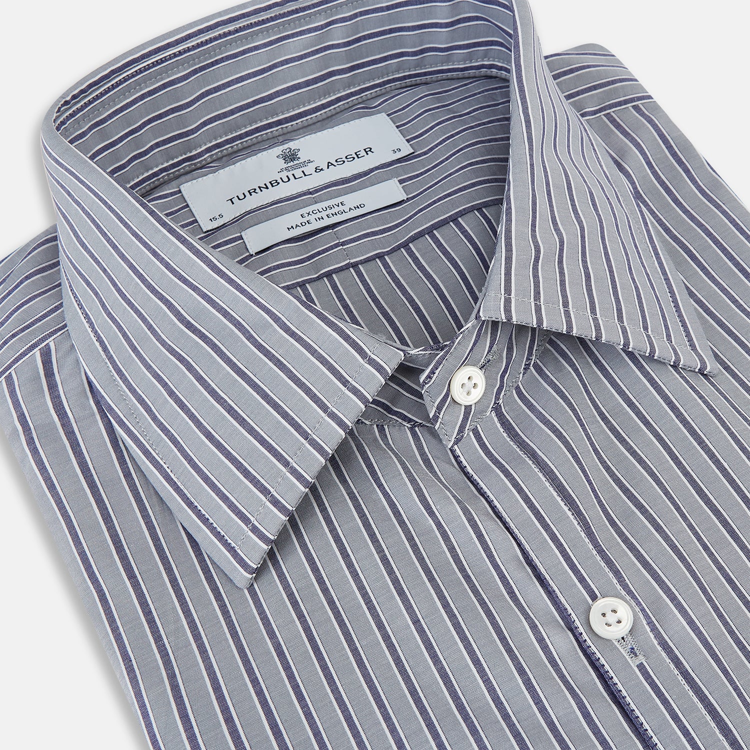 Image 2 of product The Turnbull & Asser Grey Ticking Stripe Westminster Shirt features thin vertical grey stripes and a classic collar, showcased against a plain white background.