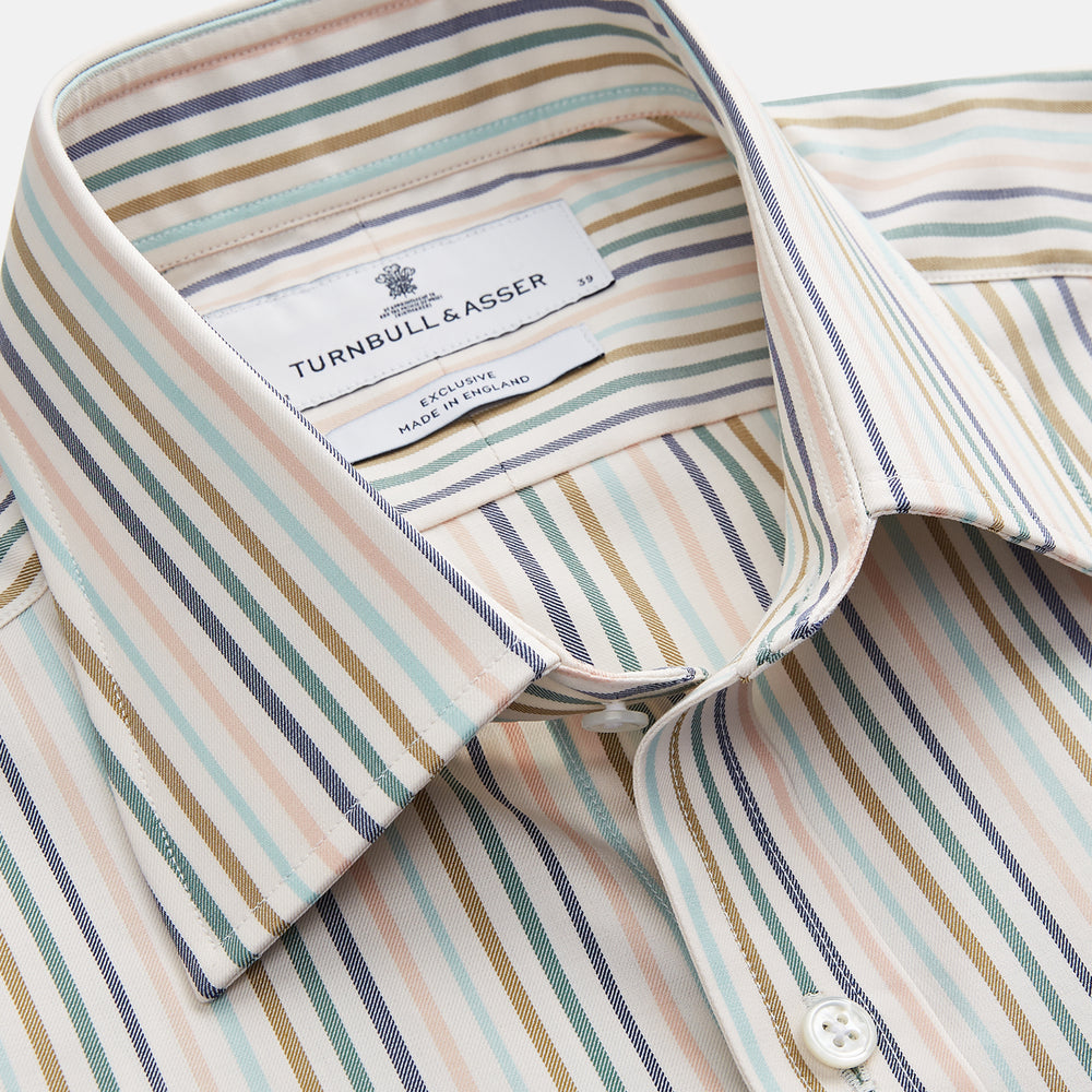 The Green Multi Stripe Regular Fit Shirt by Turnbull & Asser features a T&A collar, 3 button cuffs, and thin blue, green, yellow, and red stripes on white—adding a lively touch to any wardrobe.