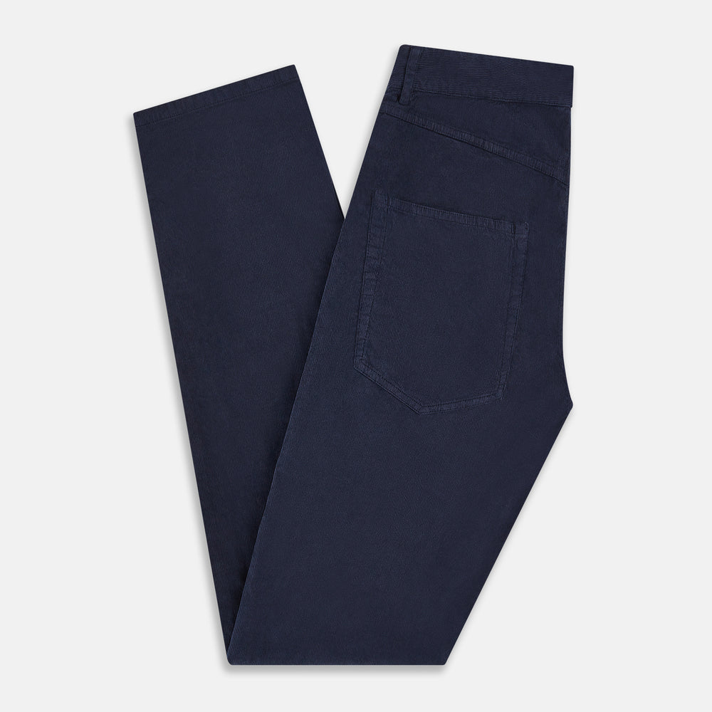 The Turnbull & Asser Light Navy Corduroy Charles Trousers feature a straight-leg fit, stretch cotton, belt loops, front pockets, and a button-zip closure—highlighting British tailoring against a white background.