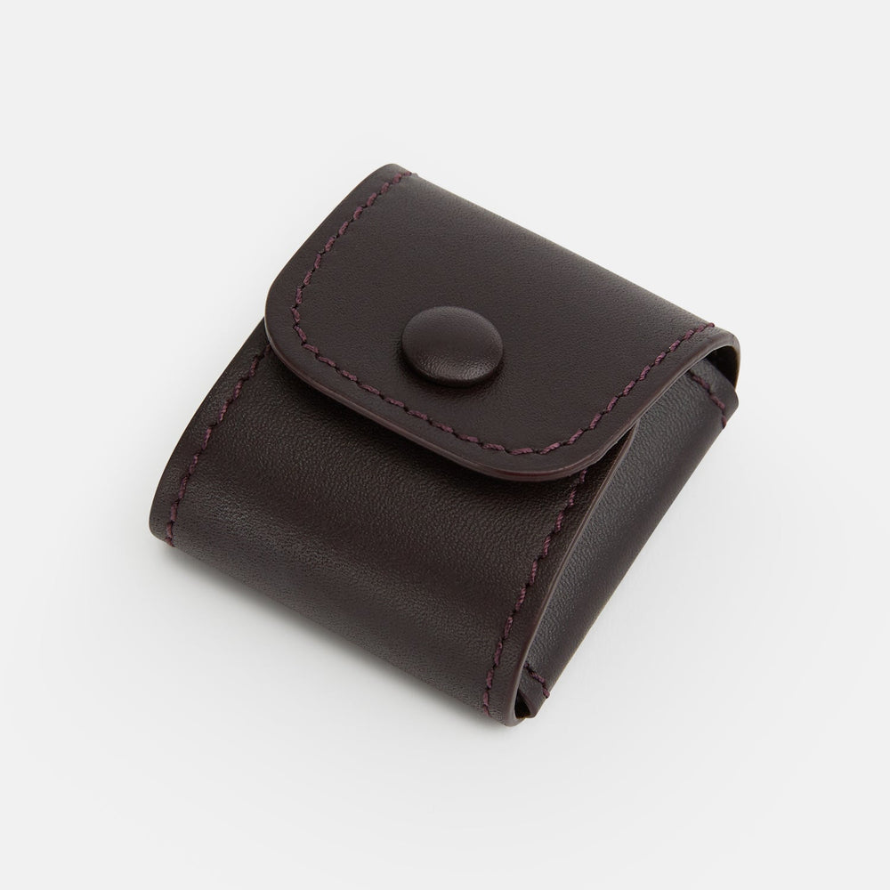 The Burgundy Leather Cufflinks by Turnbull & Asser feature square Italian leather with visible edge stitching and braided loops, presented on a white background—an elegant addition to men's accessories.