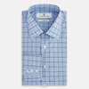 View 5 of product The Turnbull & Asser Blue and Navy Windowpane Mayfair Shirt features long sleeves, a T&A collar, buttoned cuffs, and Italian cotton in a blue and navy windowpane pattern, shown on a plain white background.