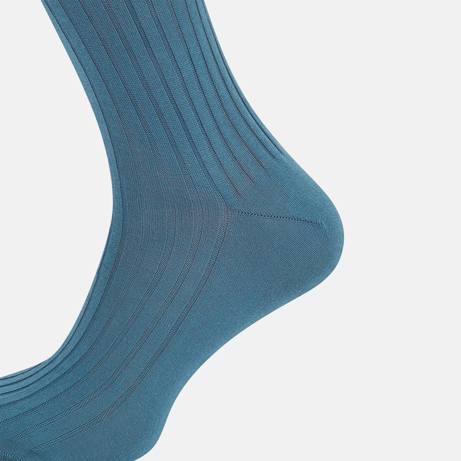 View 4 of product The Azzurro Organic Cotton Mid-Length Sock by Turnbull & Asser, featuring a ribbed texture in blue, is displayed against a plain white background.