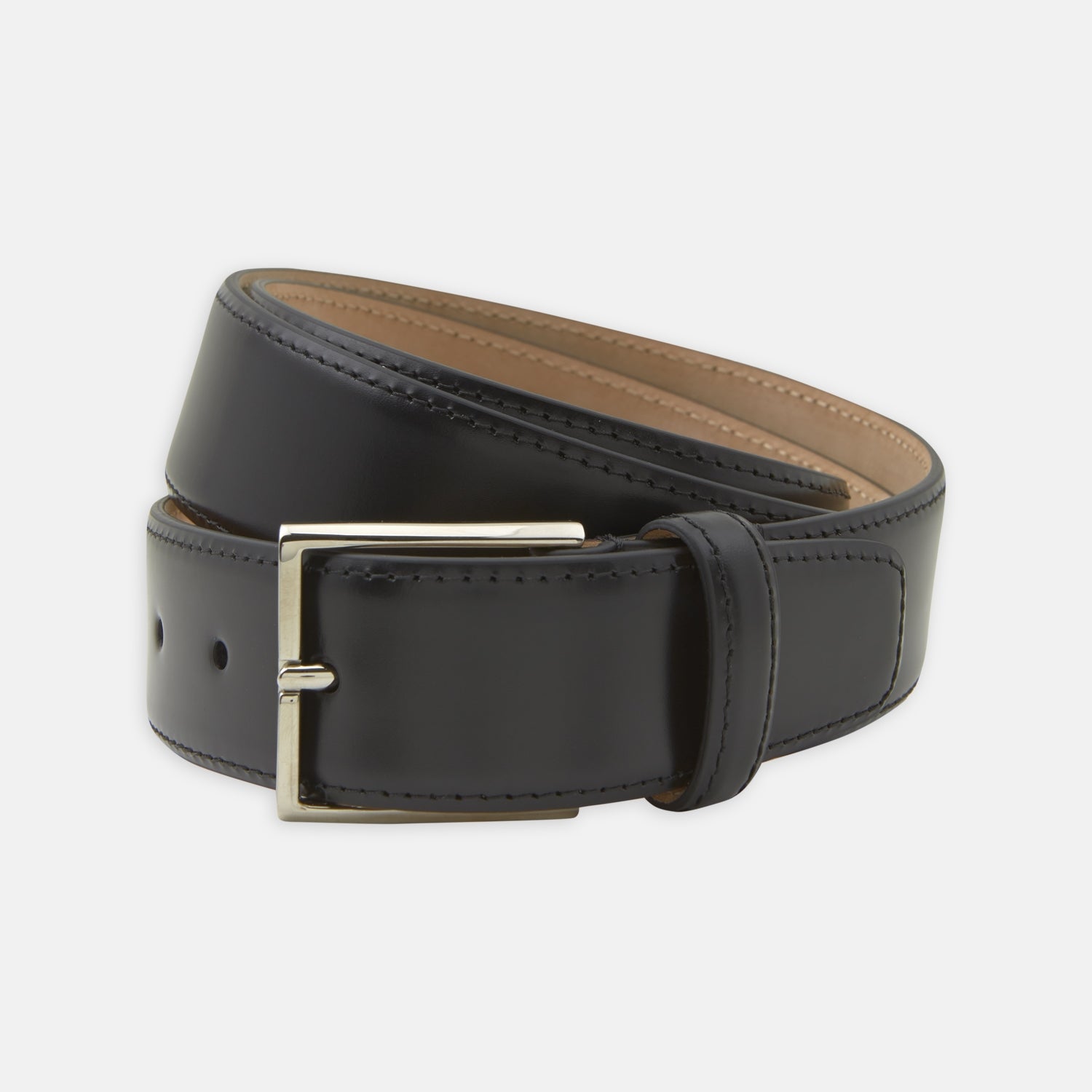 View 1 of product The Turnbull & Asser Black Nubuck Leather Evening Belt features a coiled design, silver rectangular buckle, and tan interior, elegantly displayed against a plain white background.