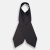 View 2 of product The Turnbull & Asser Blue and Dark Brown Micro Dot Silk Cravat features evenly spaced blue micro dots on dark brown silk, displayed neatly folded on a white background.
