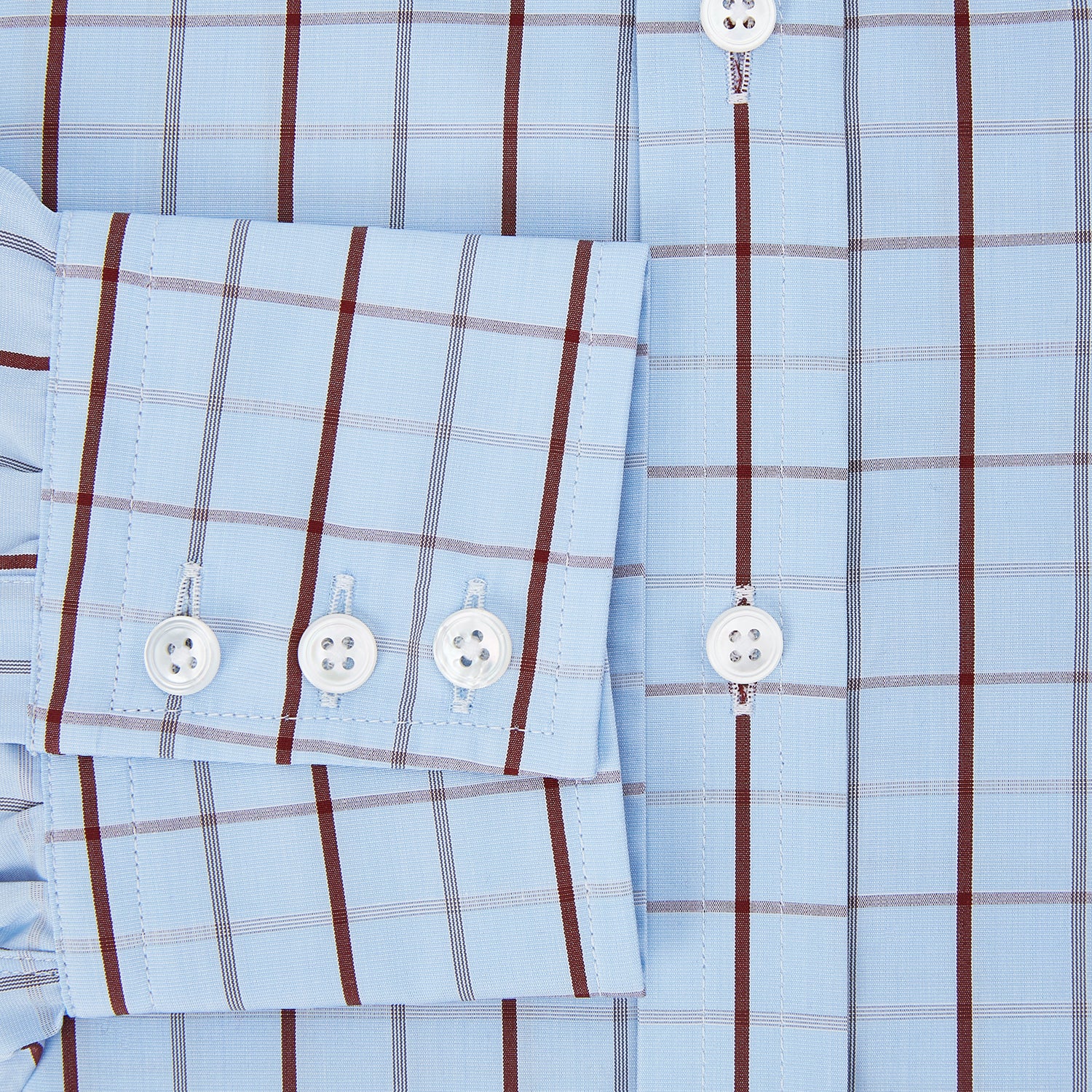 View 4 of product The Burgundy Multi Combination Check Mayfair Shirt by Turnbull & Asser features a classic check pattern and refined British craftsmanship, laid flat on a white background.