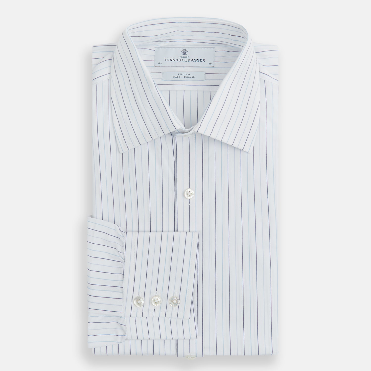 View 5 of product The Turnbull & Asser Blue Wide Pinstripe Mayfair Shirt is a long-sleeved, collared, button-down style crafted from organic cotton, featuring wide blue pinstripes on a white background.