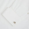 View 3 of product Turnbull & Asser’s Silver Striped Circle Cufflinks feature classic diagonal grooves and are shown against a white background.