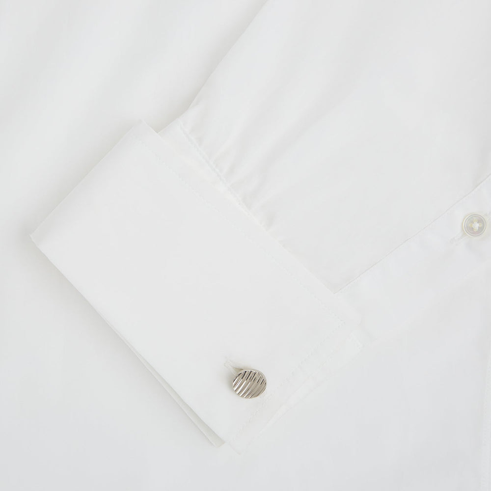 Turnbull & Asser’s Silver Striped Circle Cufflinks feature classic diagonal grooves and are shown against a white background.