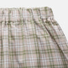 View 2 of product Turnbull & Asser Green Multi Check Cotton Hastings Pyjama Trousers—loose-fit with elasticated drawstring waist, featuring a brown, green, and white plaid pattern. Shown flat on a white background.