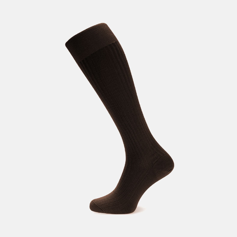 A single Brown Long Cotton Sock by Turnbull & Asser is shown on a neutral background, highlighting its knee-high length and ribbed design, crafted from premium Egyptian cotton.