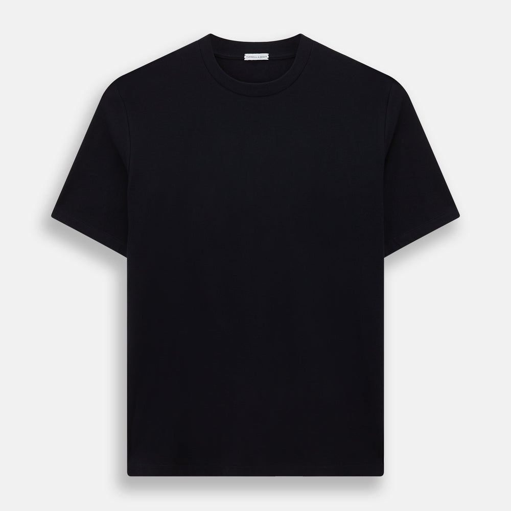 A navy short-sleeve pyjama shirt by Turnbull & Asser is laid flat on a white background, displaying the front view. Its soft fabric ensures comfort with no visible logos, designs, or patterns on the shirt.