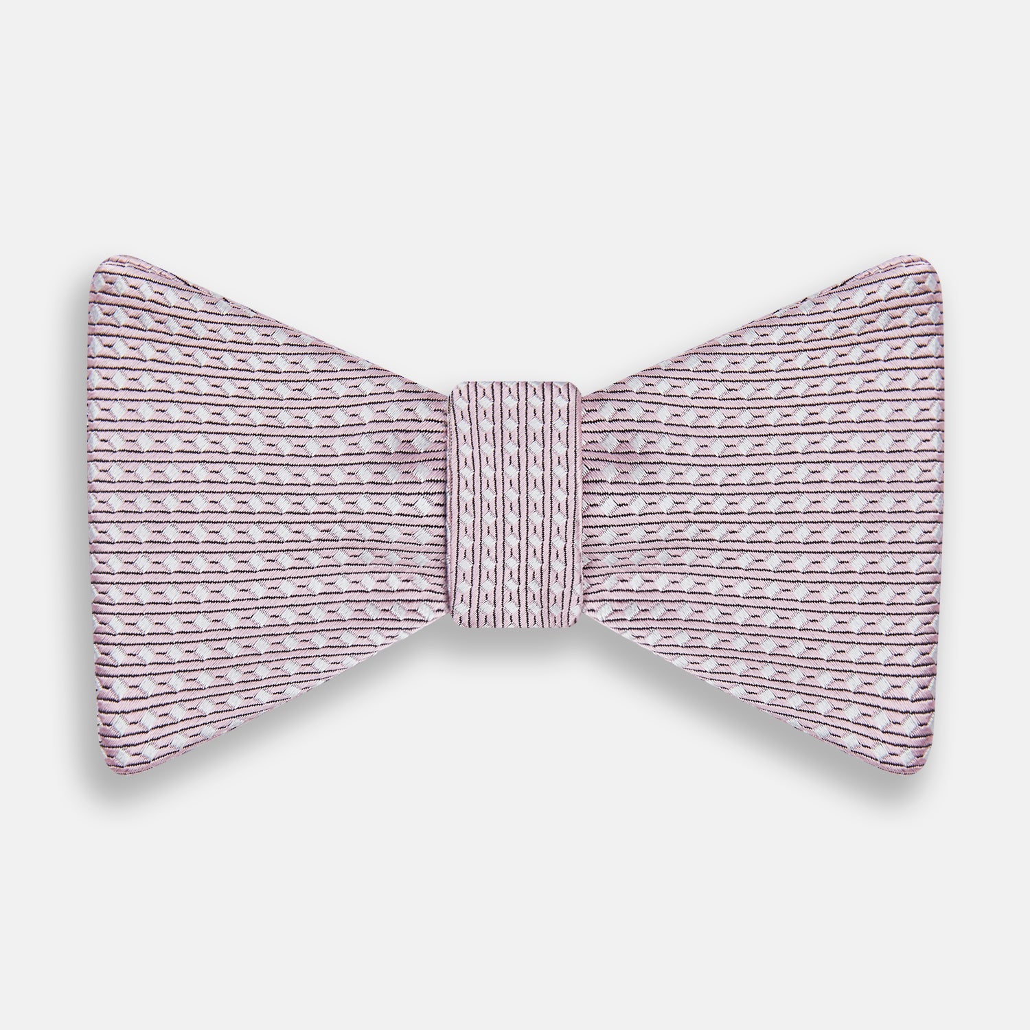 View 1 of product The Turnbull & Asser Pale Pink and White Square Silk Bow Tie features white stripes and subtle square patterns, ideal for formalwear. Shown on a white background.
