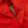 View 7 of product Wearing the Turnbull & Asser Red Walter Sealup Parka with Detachable Liner, black pants, and white sneakers, a person stands in profile against a plain light background—perfect for travel.