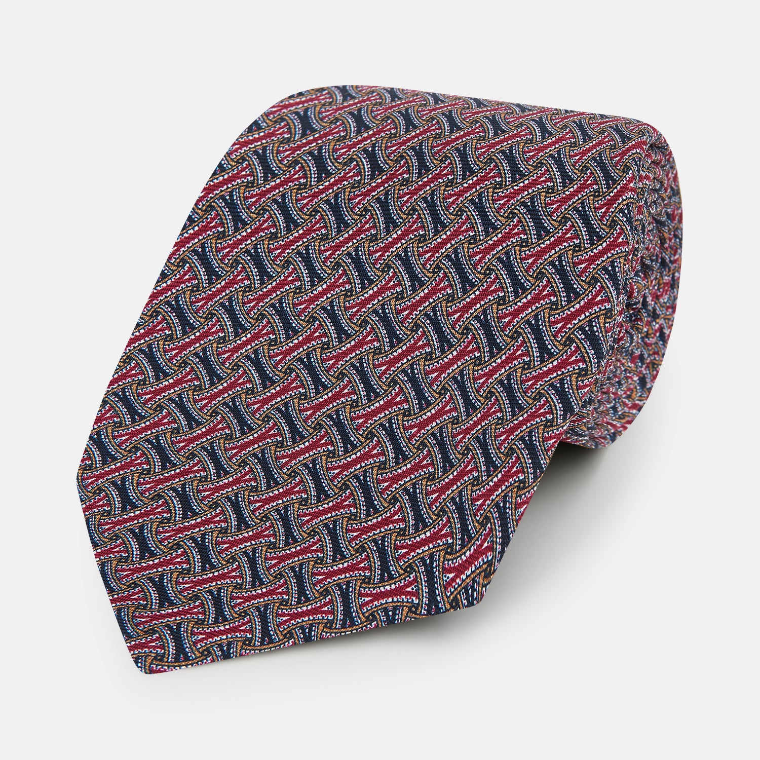 View 1 of product The Turnbull & Asser Burgundy and Navy Weave-Patterned Printed Silk Tie features an intricate geometric design, shown rolled on a plain white background.