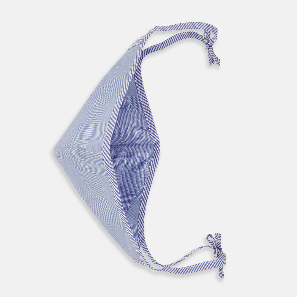 The Turnbull & Asser Blue Fine Check Zephyr Cotton Commuter Mask features a light blue and white check pattern, adjustable side ties, and comes with 3 Viroformula™ filters. Shown on a plain white background.