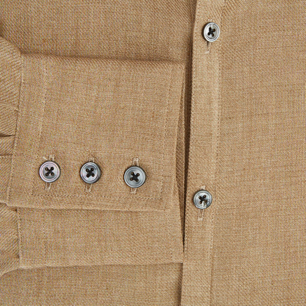 The Turnbull & Asser Camel Linen Windsor Shirt features long sleeves, a tailored fit, and classic collar in light brown camel linen, shown against a white background.
