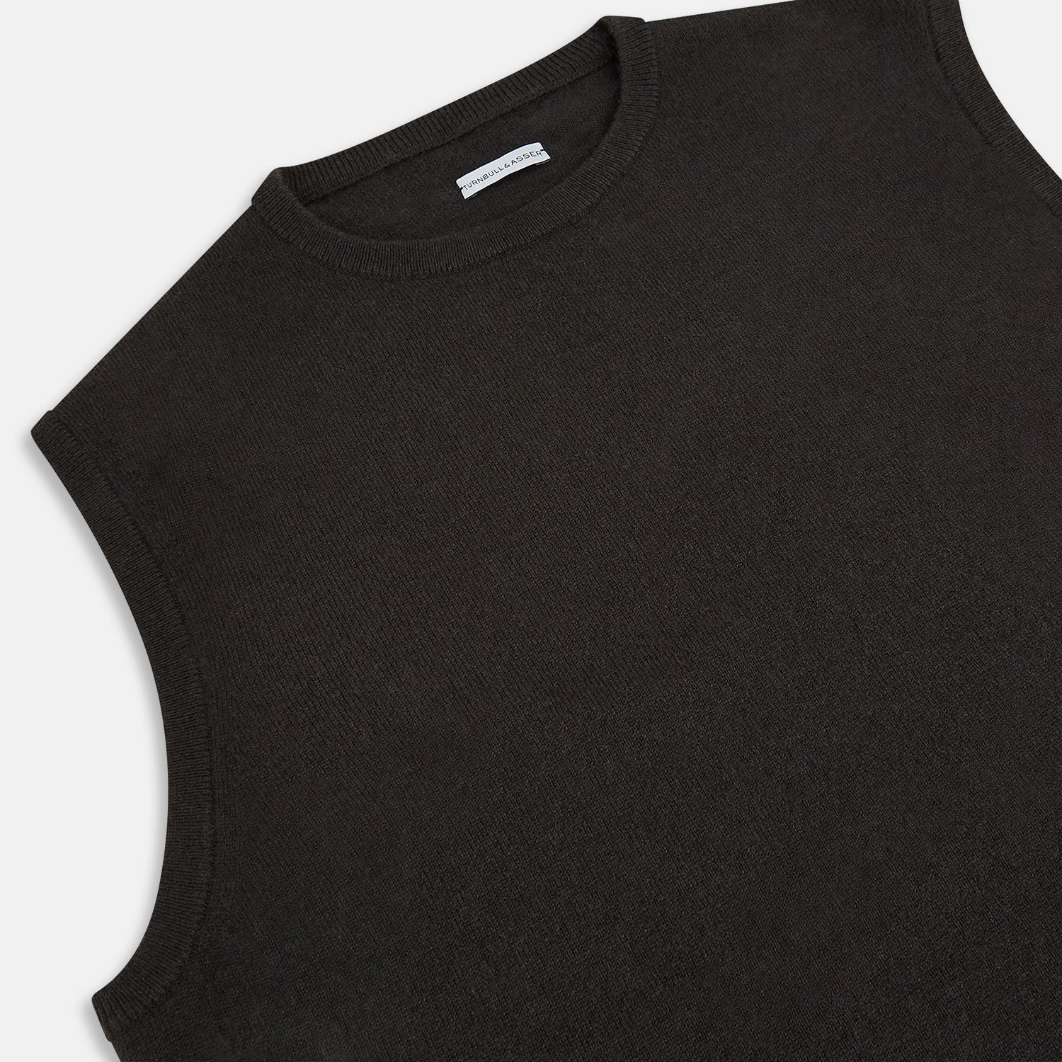 View 2 of product A dark brown cashmere round neck vest by Turnbull & Asser, sleeveless and displayed against a plain white background.