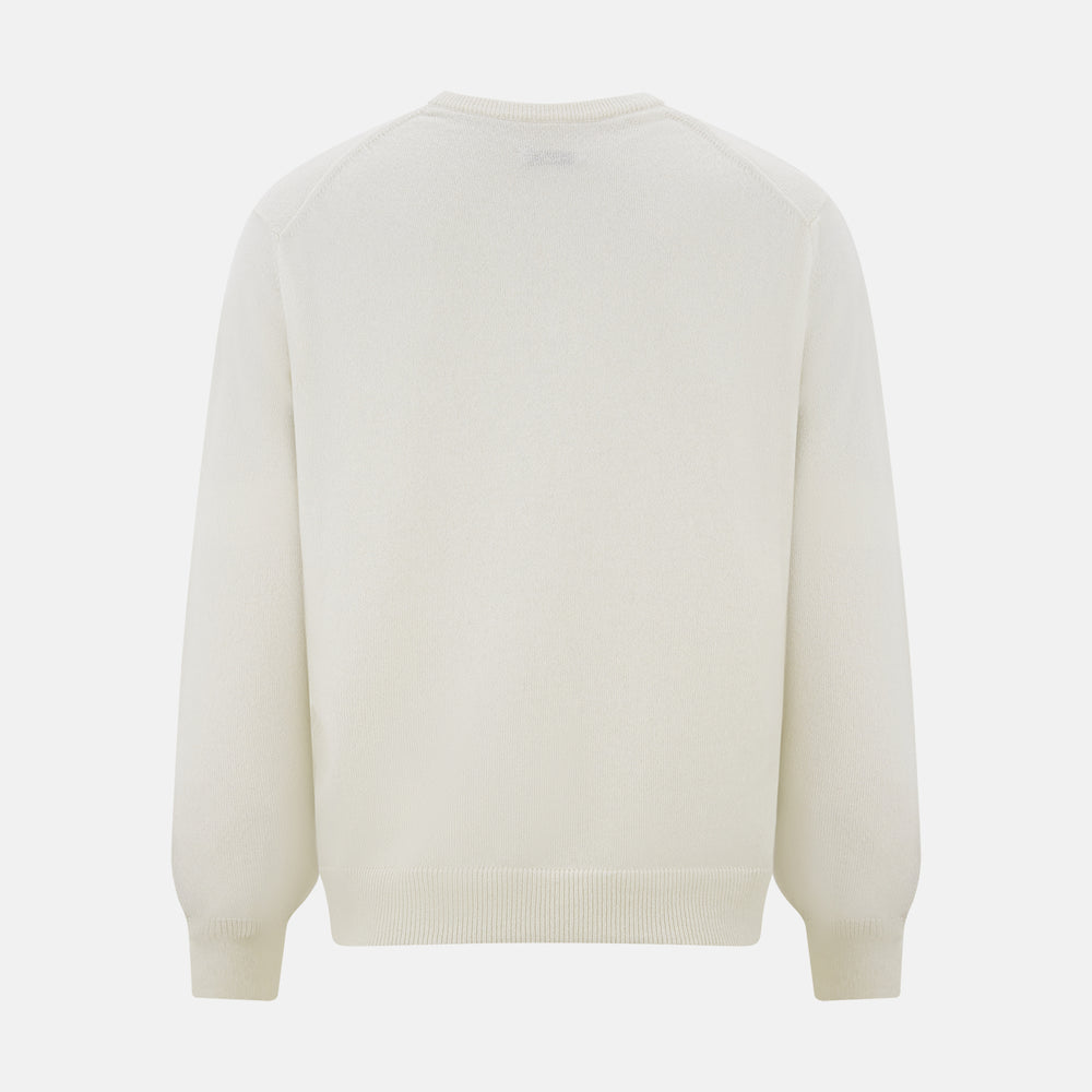 The Turnbull & Asser White Cashmere V-Neck Jumper features long sleeves and a versatile light cream shade, making it a timeless addition to your knitwear collection.