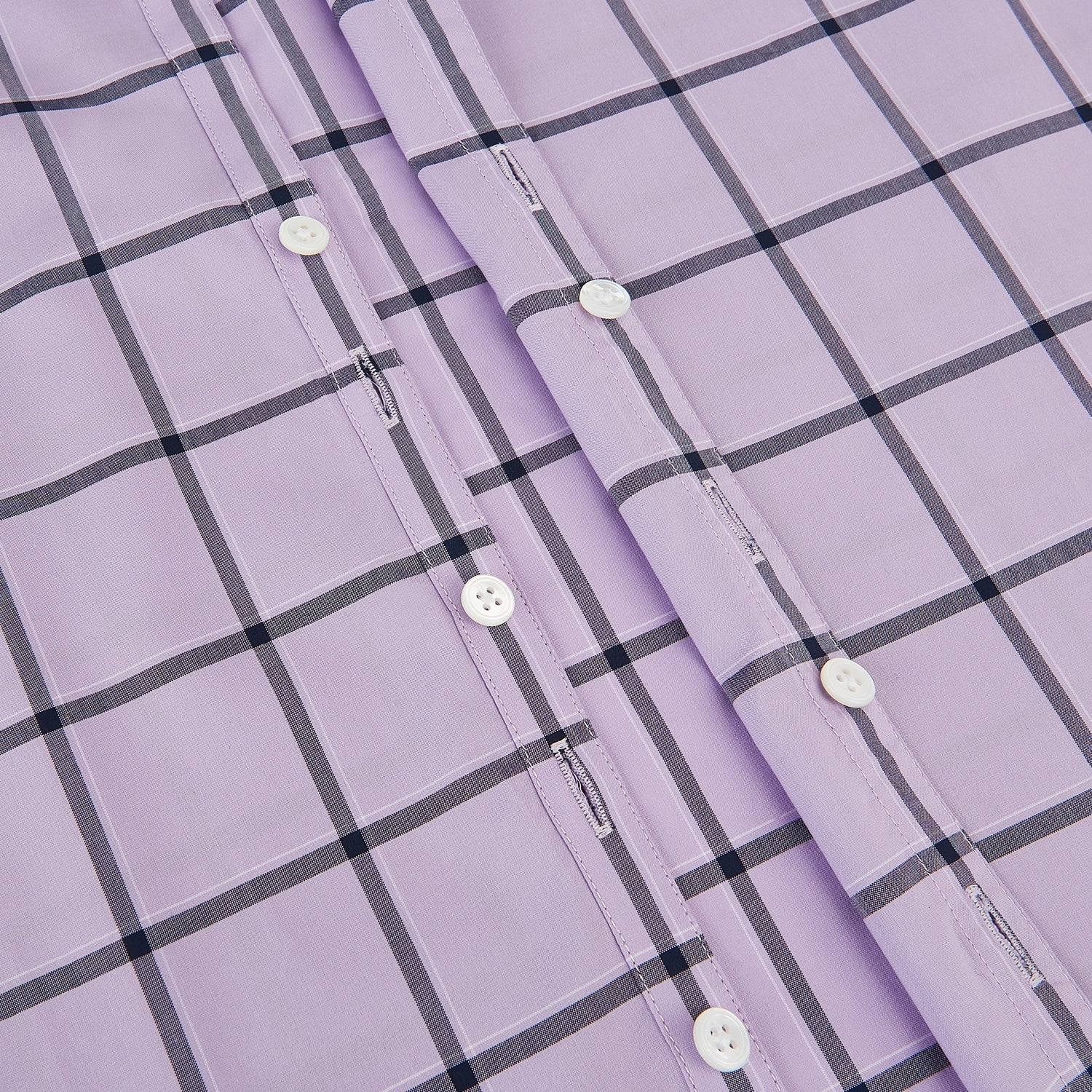 Image 7 of product A long-sleeve, button-up Lilac Grid Check Windsor Shirt by Turnbull & Asser, featuring a black windowpane pattern and a refined Windsor collar, displayed on a plain white background.