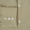 View 4 of product The TAUPE WINDSOR SHIRT by Turnbull & Asser features a Windsor collar and buttoned cuffs. This long-sleeve shirt showcases refined British design and is displayed flat on a white background.
