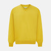 View 1 of product The Turnbull & Asser Canary Yellow Fine Merino V-Neck Jumper, crafted from soft knitwear, features long sleeves and is displayed on a white background.