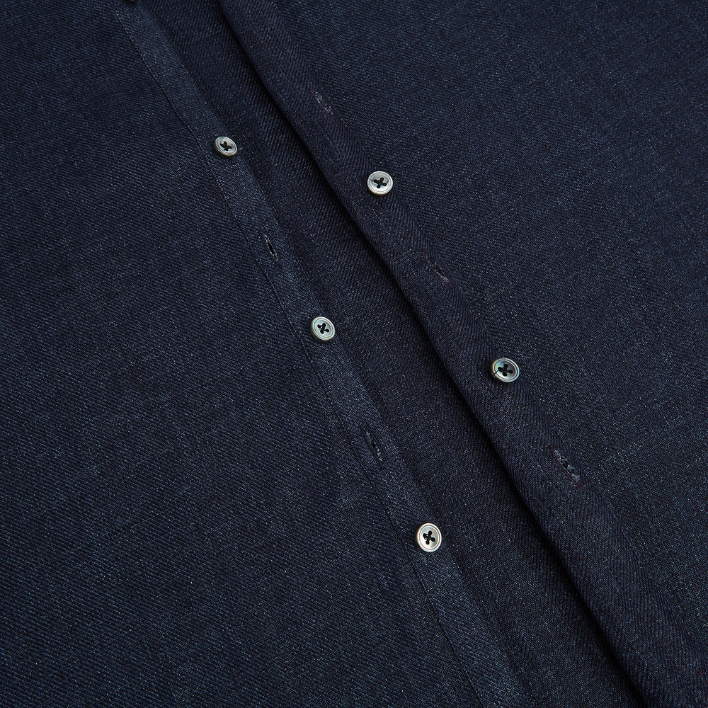 The Navy Linen Windsor Shirt by Turnbull & Asser features long sleeves, white buttons, a Turnbull collar, and buttoned cuffs in dark navy blue linen. Shown laid flat on a white background.
