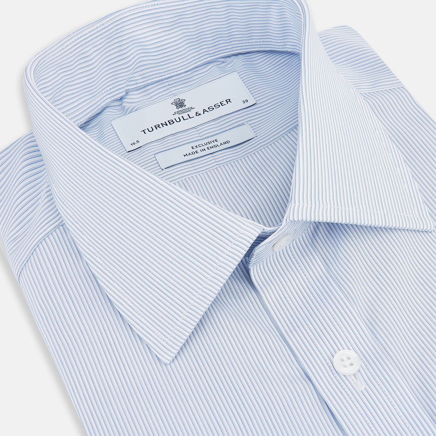 View 2 of product The Sky Blue Hairline Multi Stripe Mayfair Shirt by Turnbull & Asser, made from Italian cotton with a classic collar, white buttons, and buttoned cuffs, is displayed on a plain white background—an essential for any gentleman.
