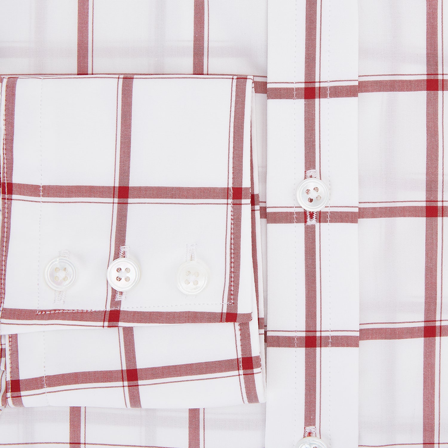 View 4 of product The Turnbull & Asser Dark Red Grid Check Mayfair Shirt is a long-sleeve white shirt made from Italian cotton, featuring a bold dark red grid pattern, button-down front, and classic collar, shown laid flat on a white background.